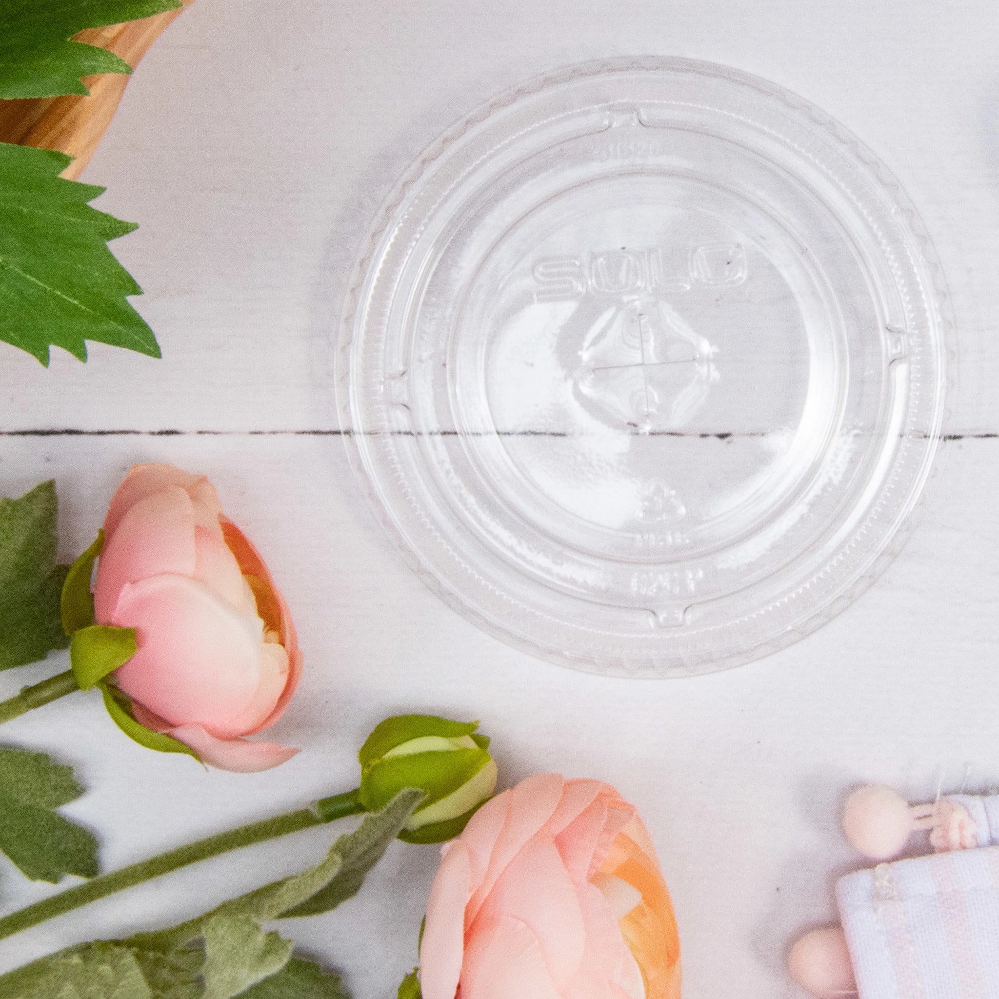 Top view of 626TS clear slotted PET lid – fits 98 mm cups.