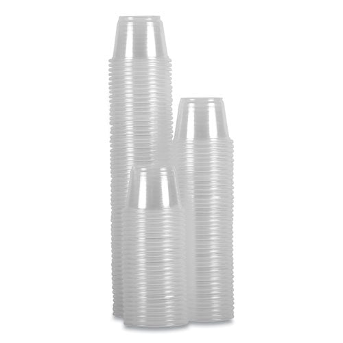 Stacks of 1 oz clear polypropylene plastic portion cups, 2,500 per carton, ideal for sauces, dressings, and samples.