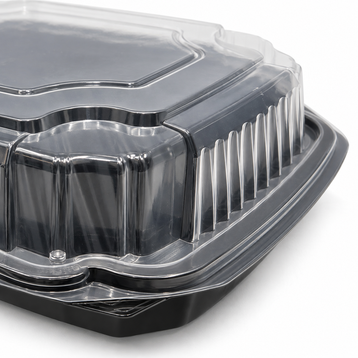 EcoPax PVS991-BK hinged takeout container close-up showing the clear ribbed lid, rim and black polypropylene base
