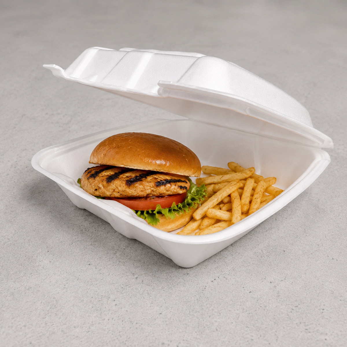 EcoPax Regal RE993S white foam container with illustrative sandwich and fries; food not included