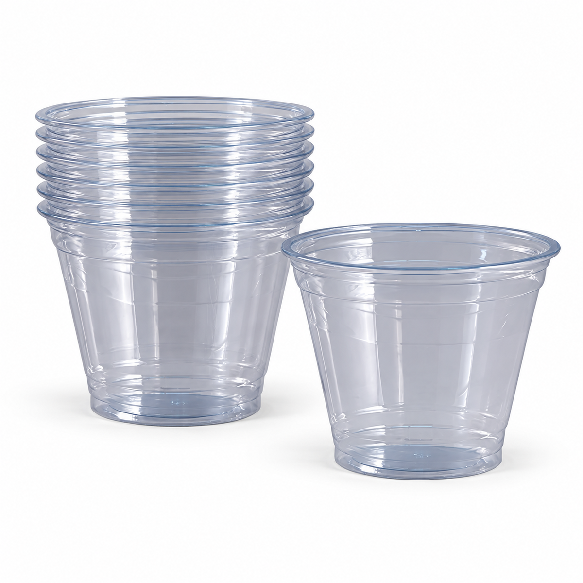 AI-assisted illustration of Empress EPET09 9 oz clear PET cups nested beside a single cup