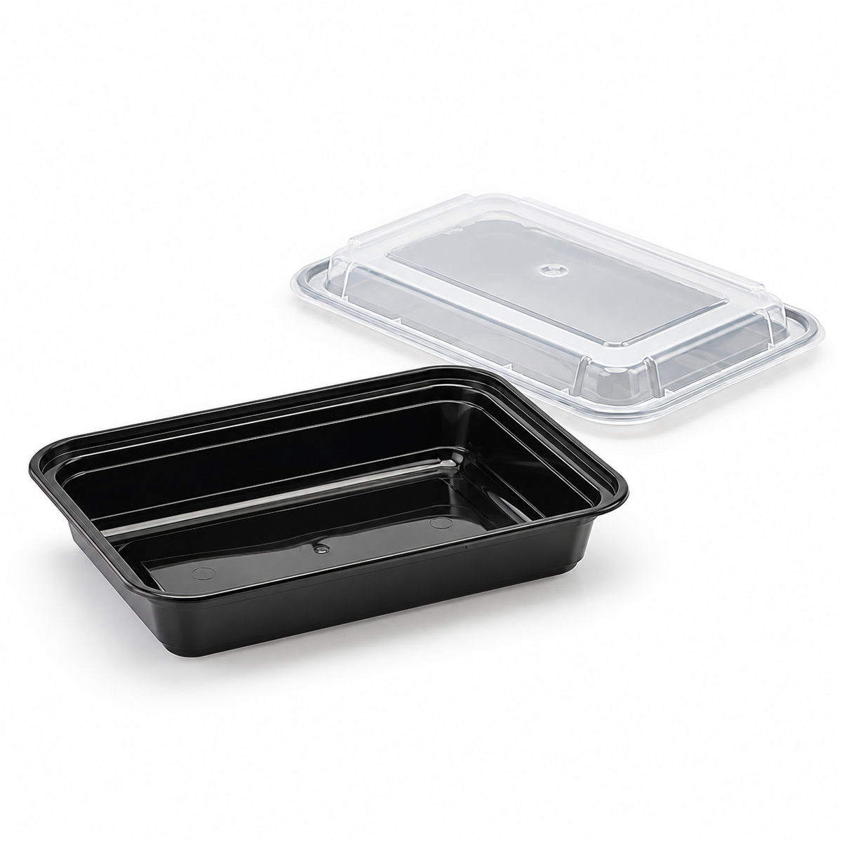 Karat IM-FC1028B 28 oz black PP rectangular container with its matching clear lid displayed separately