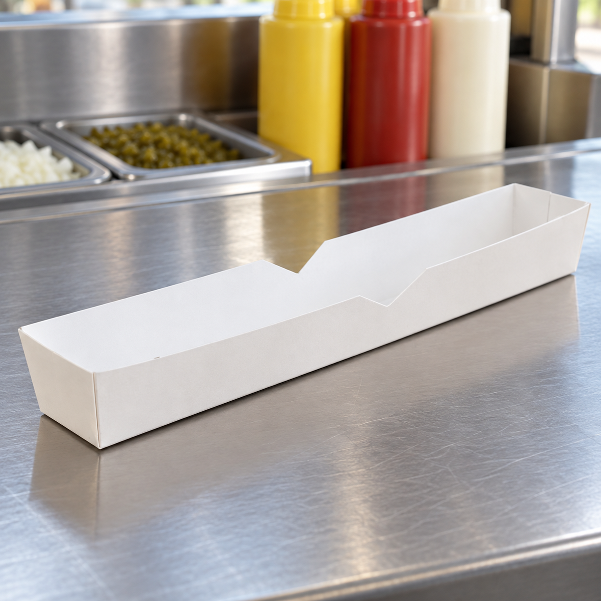 Southern Champion Tray 0711 white hot dog tray at a concession preparation counter