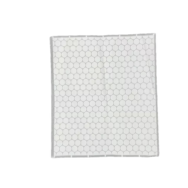 Kari-Out insulated foil wax sheet showing white patterned paper side, 14 x 16 in