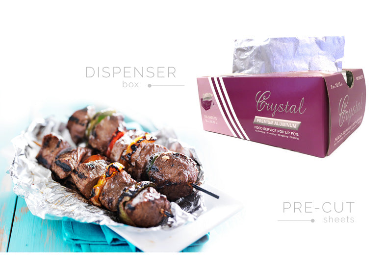 Crystalware 9 x 10.75 aluminum foil pop-up sheets and 500-sheet dispenser; 6 boxes per 3,000-sheet case