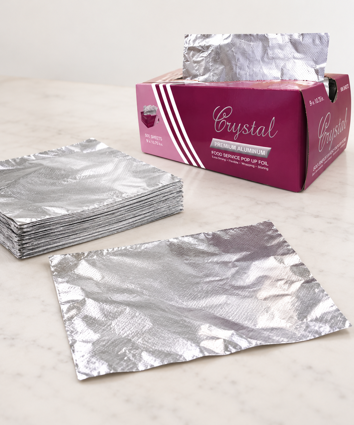 AI-assisted studio view of Crystalware FPU9103000 foil sheets and 500-sheet inner dispenser