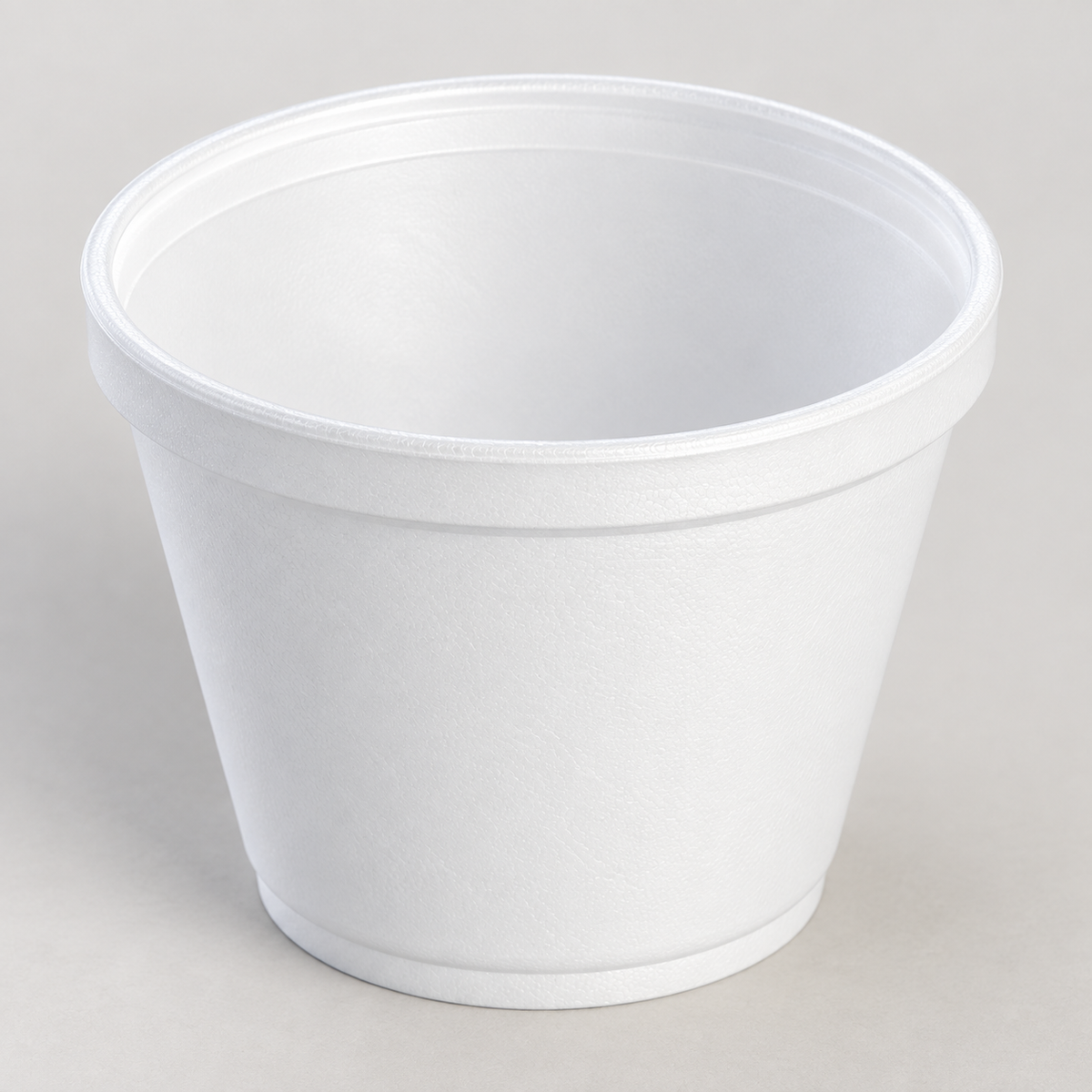 Dart 12SJ20 white 12 oz foam container showing open interior; AI-assisted supporting view