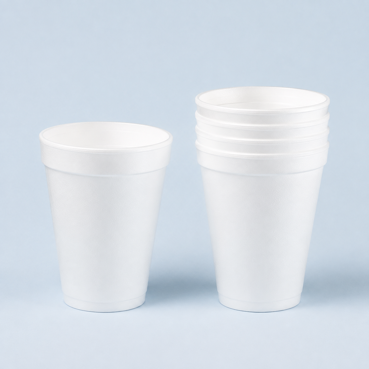 Dart 16J16 white 16 oz foam cup and nested stack, AI-assisted illustration