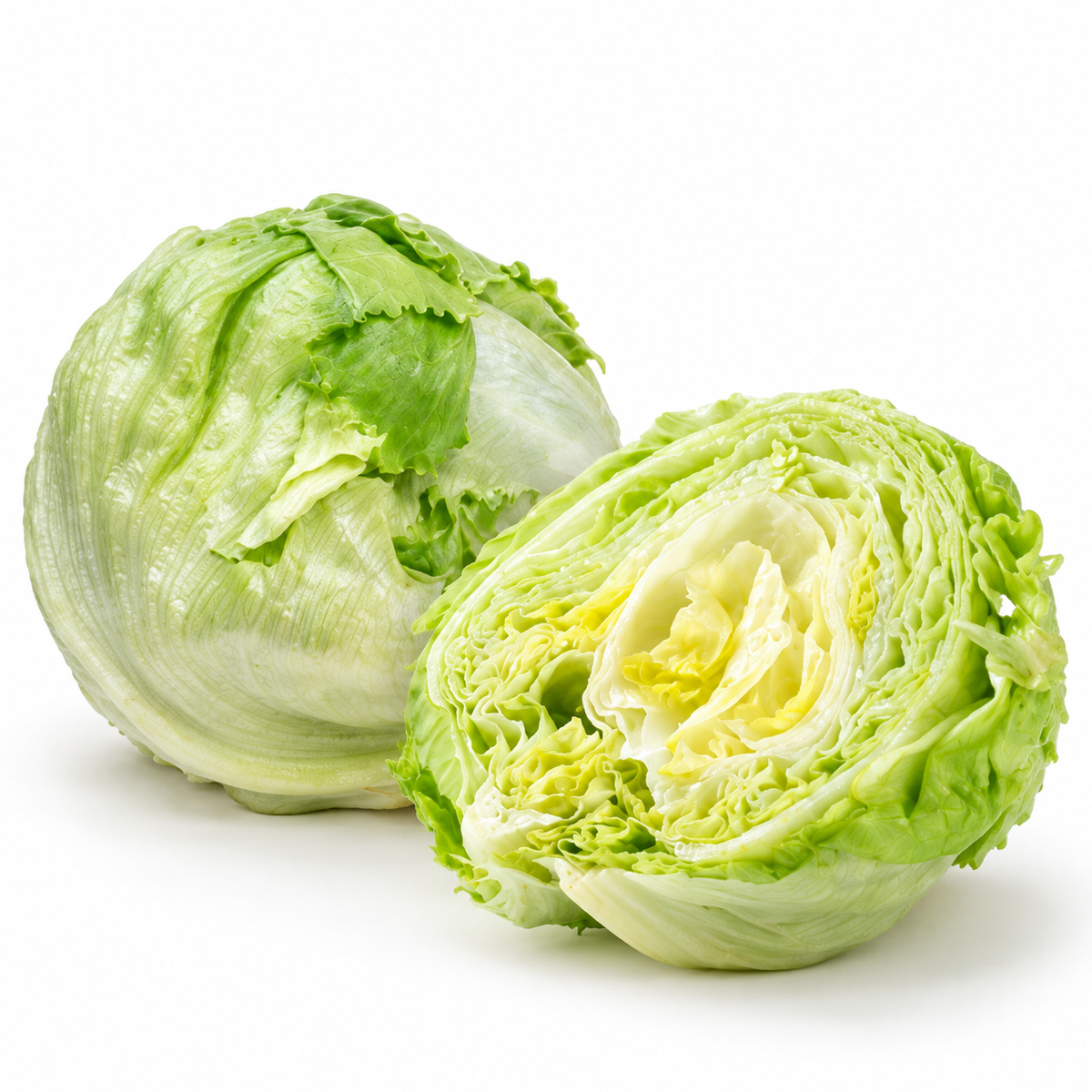 Whole and halved iceberg lettuce showing pale green leaves and a compact interior