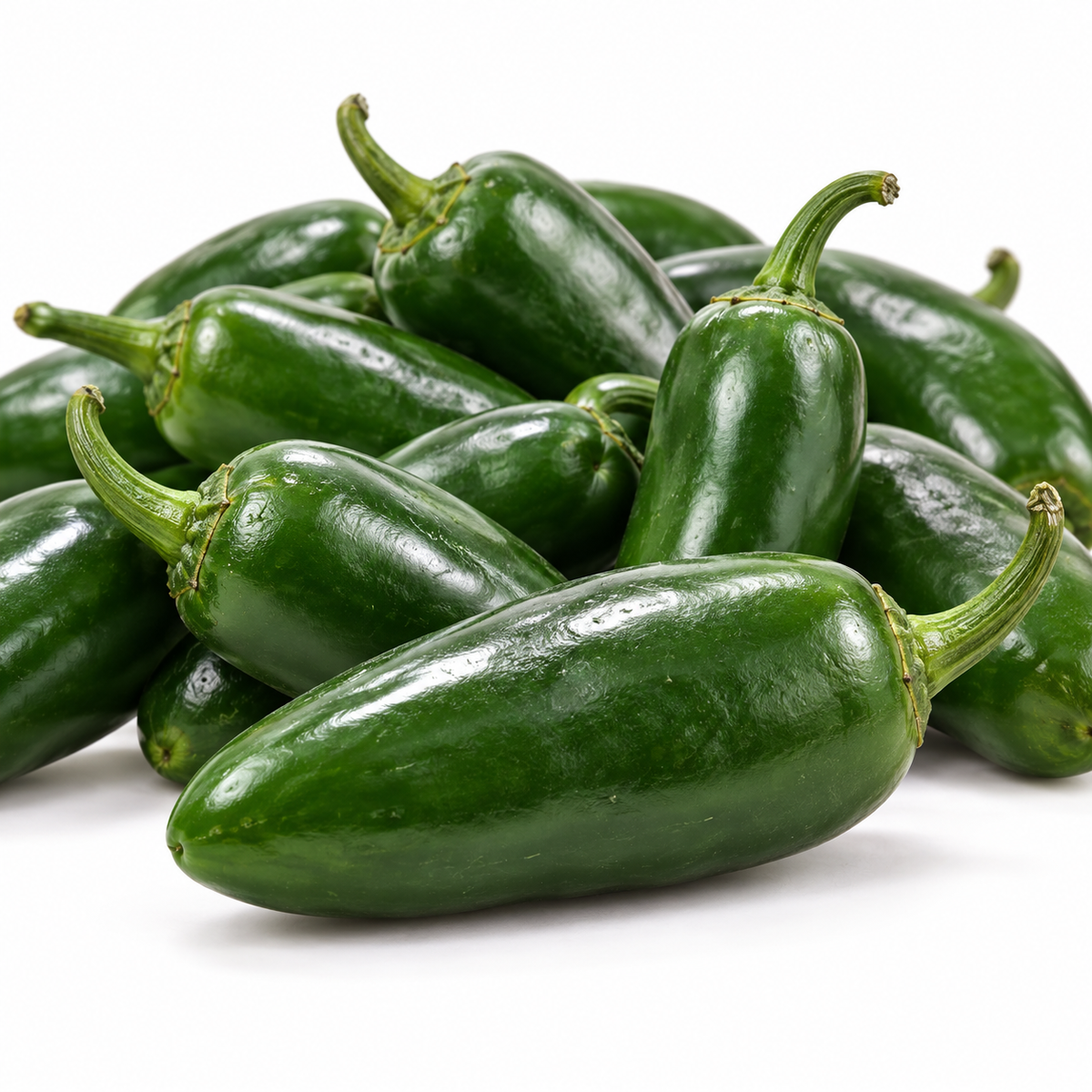 Whole fresh green jalapeño peppers, sold in a 30 lb case