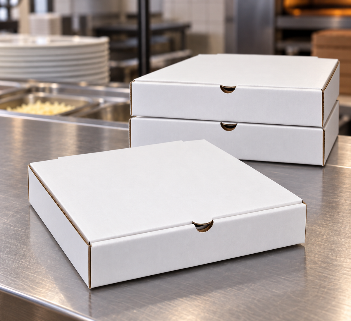 RiteBox PB0808 white 8 inch pizza boxes on a restaurant pickup counter